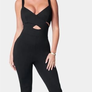 Black Bebe cut out jumpsuit. Never been worn. Tags attached